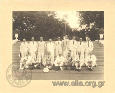 Antonis Zarifis in a large group portrait of men