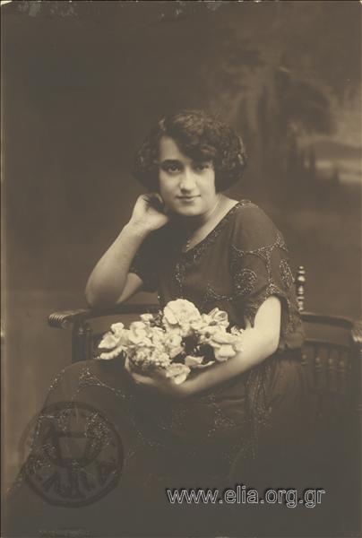 Portrait of a woman with a bouquet.