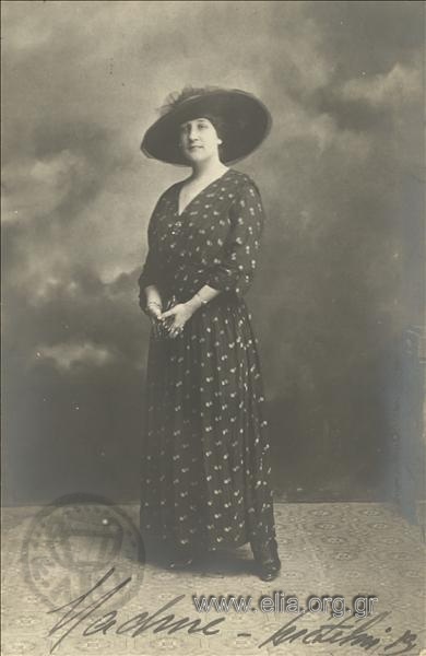 Portrait of a woman wearing a hat.