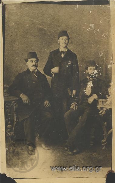 Portrait of three men in fezzes