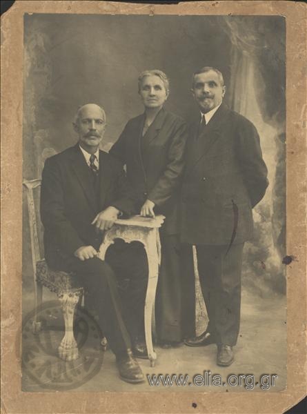 Portrait of a woman and two men.
