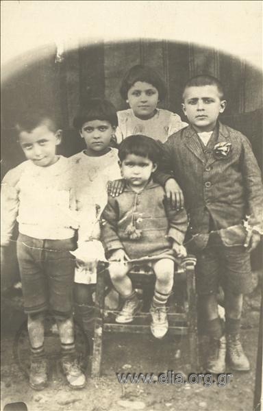 Portrait of five children.