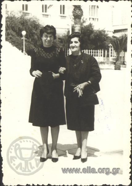 Portrait of two women on a square.
