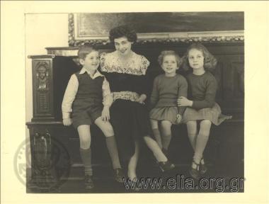 Freideriki with her three children, Konstantinos, Eirini and Sofia.