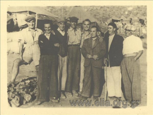 Commemorative photograph of exiles. From the left: Giorgos Giolasis, Menelaos Loudemis, Dim. Fotiadis, Manos Katrakis, Tzavalas Karousos, Nik. Papaperiklis, Giannis Imvriotis, Kostas Matsakas