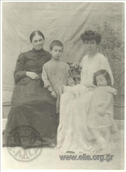 Melissanthi (1910-), the grandmother, her mother Roubini, her brother Georgios and cat Lilika.