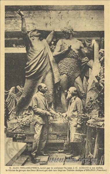 Alexandros Filadelfefs at the atelier of French sculptor J.G. Achard in front of a monumental sculpted composition