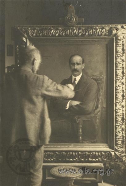 Ο Γεώργιος Ιακωβίδης ζωγραφίζει πορτραίτο.