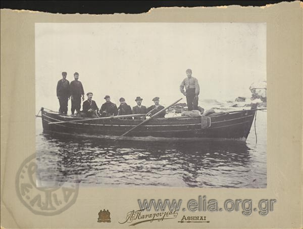 Men photographed on a boat