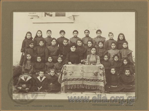 Group portrait of students of the Mavromati Girls' School with teachers.