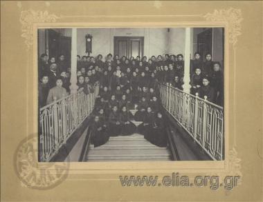 Group portrait of students and teachers on the stairs of the 