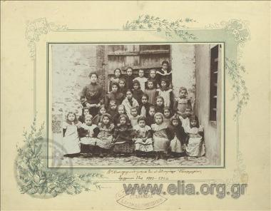Group portrait of students of the 2nd class with a Nursery School teacher.