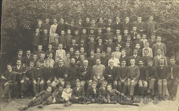 Group portrait of Greek  and foreign students of a High School for boys with teachers.
