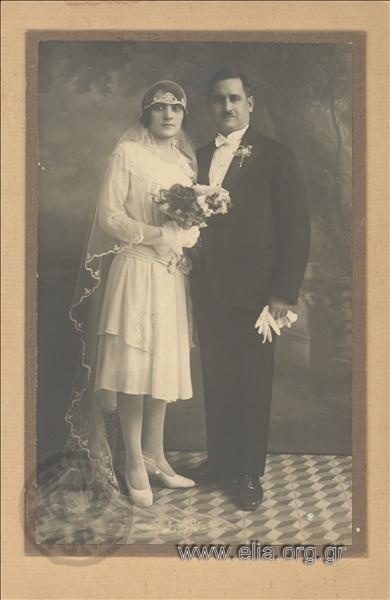 Portrait of a newly-wedded couple
