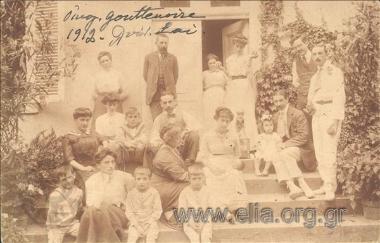 Family portrait in the courtyard of a house.
