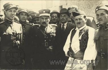Minister for Military Affairs Georgios Kondylis and his aid-de-camp Kourouklis visiting a model artillery unit