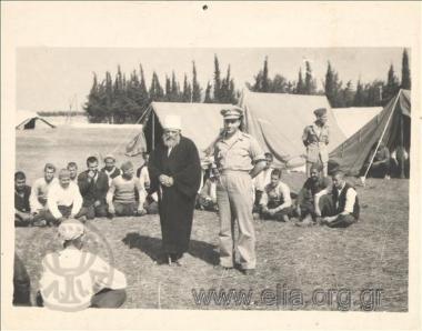 Hodja speaks to Ottoman captives in the presence of the military commander of the XI Division(?).