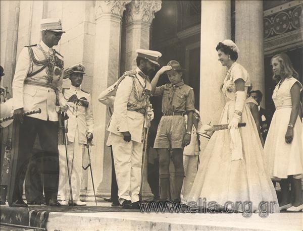 Emperor of Ethiopia Haile Selassie bowing at Queen Frederiki at the entrance to the Cathedral, a state ceremony