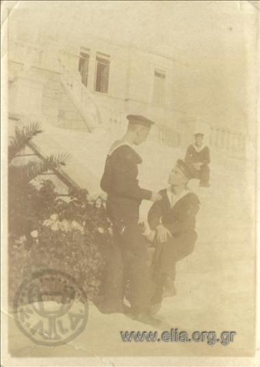 Naval office cadets talking at the marble stairway of the Naval Port (?)