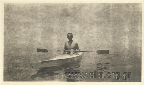Prince Pavlos rowing.