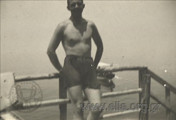 Prince Pavlos in a swimsuit.