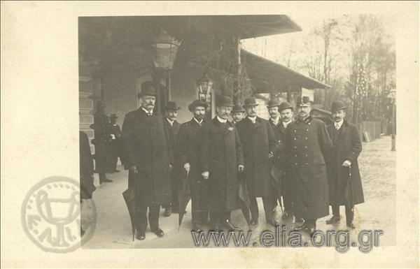 Kimon Digenis and a group of men at a railway station (?)