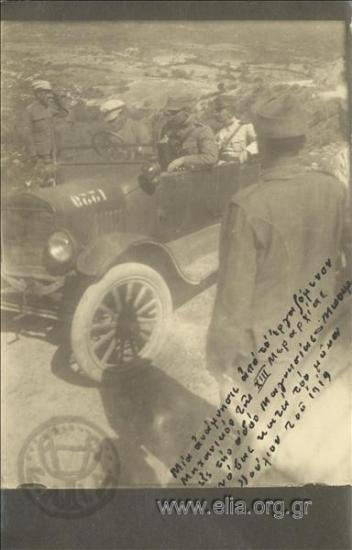 Kimon Digenis and two officers in a car on the Magnisia - Bournovas stretch of road
