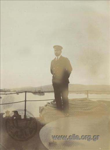 Royal Navy Sub Lieutenant Sofoklis Dousmanis on the deck of Battleship Averof