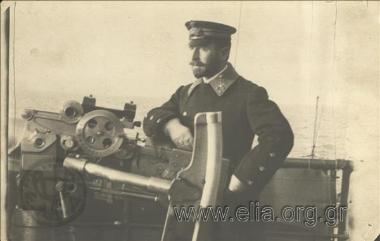 Royal Navy Sub Lieutenant Sofoklis Dousmanis on the deck of Battleship Averof