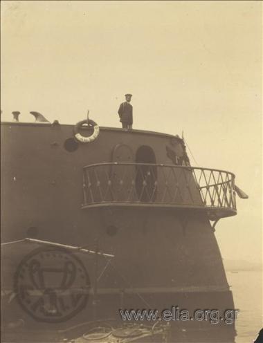 Sofoklis Dousmanis on the stern of Battleship Averof