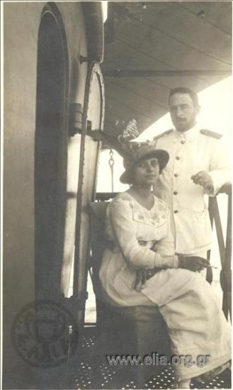 Commander of vessel Averof Captain Sofoklis Dousmanis and Esme Metaxa on board the battleship