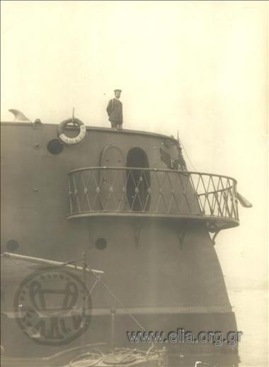 Commander of vessel Averof Captain Sofoklis Dousmanis at the stern of the battleship