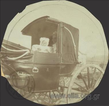 Nikolas Kalas (1907-1988) as a baby in a car at Palaio Faliro.