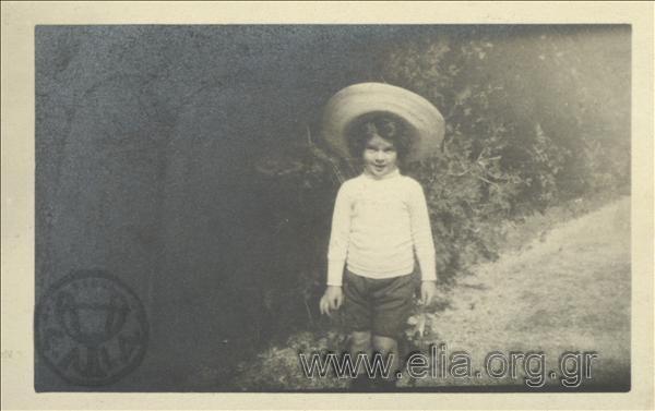 Nikolas Kalas (1907-1988) as a childwith a hat, in the National Garden.