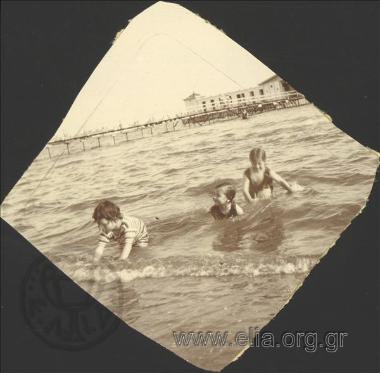 Children swimming in Palaio Faliro.The bent over boy in swimmsuit is Nikolas Kalas.