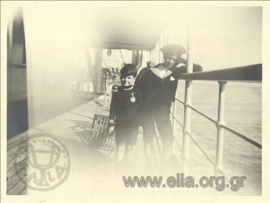 Nikolaos Kalas (1907-1988) with a friend on the deck of a boat