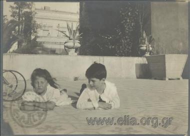 Nikolas Kalas (1907-1988) as a child with a friend lying on the roof top