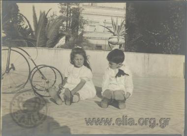 Nikolas Kalas (1907-1988) as a child with a friend lying on a roof top