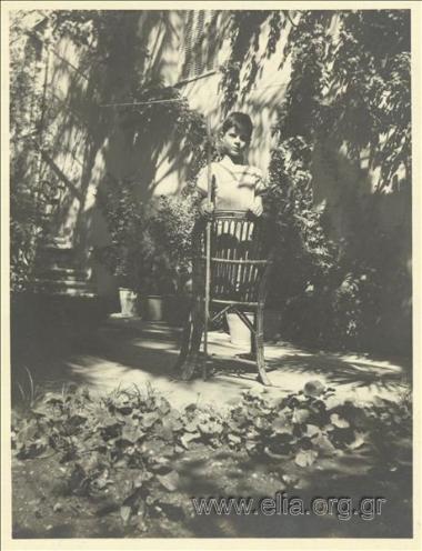 Nikolas Kalas (1907-1988) as a child in a garden.