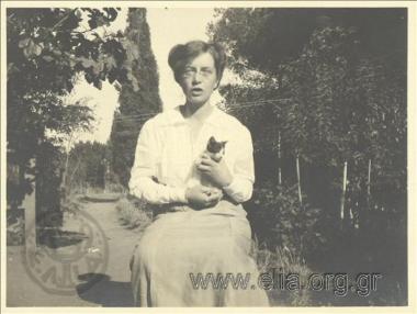 The nanny of Nikolas Kalas (1907-1988) in the garden of a residence, in Kephisia.