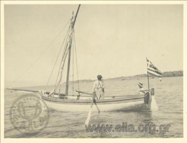 Βάρκα με την ελληνική σημαία.