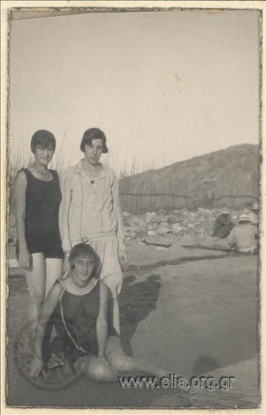 Portrait of three women on the coast.