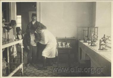 Greek  occupation of Smyrna. Health laboratory. Young Turkish man is given an injection against rabies by department head Mr Komninos
