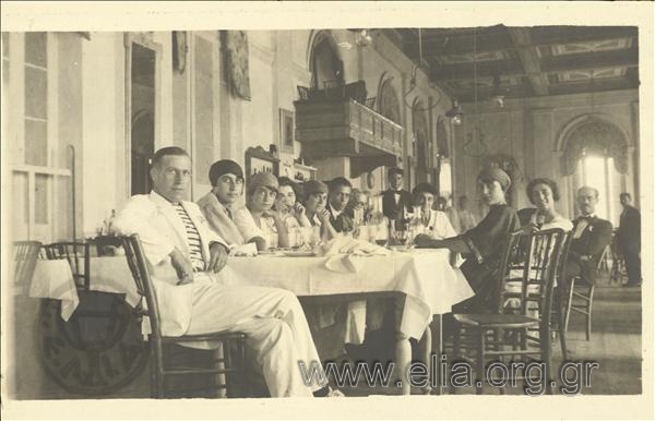 Excursionists  in a hotel (or restaurant) dining area