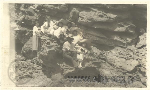 Excursionists  on some rocks of the island