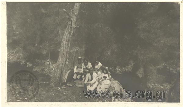 Excursionists  in a forest on the island