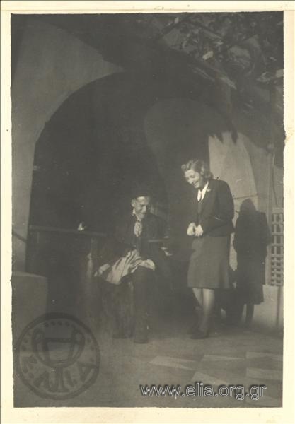 Psachna, a woman and an elderly man in a garden