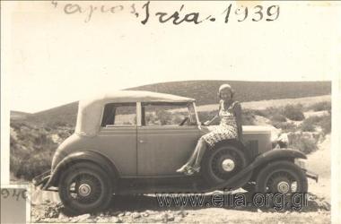 Saint, woman on a car