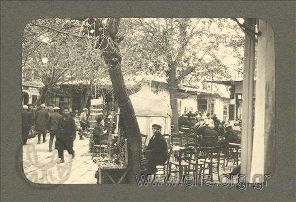 Square with coffeehouses and people