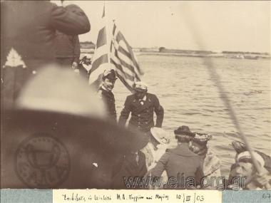 Grand Duke Georgios Michailovits and his wife, Grand Duchess Maria, boarding a boat